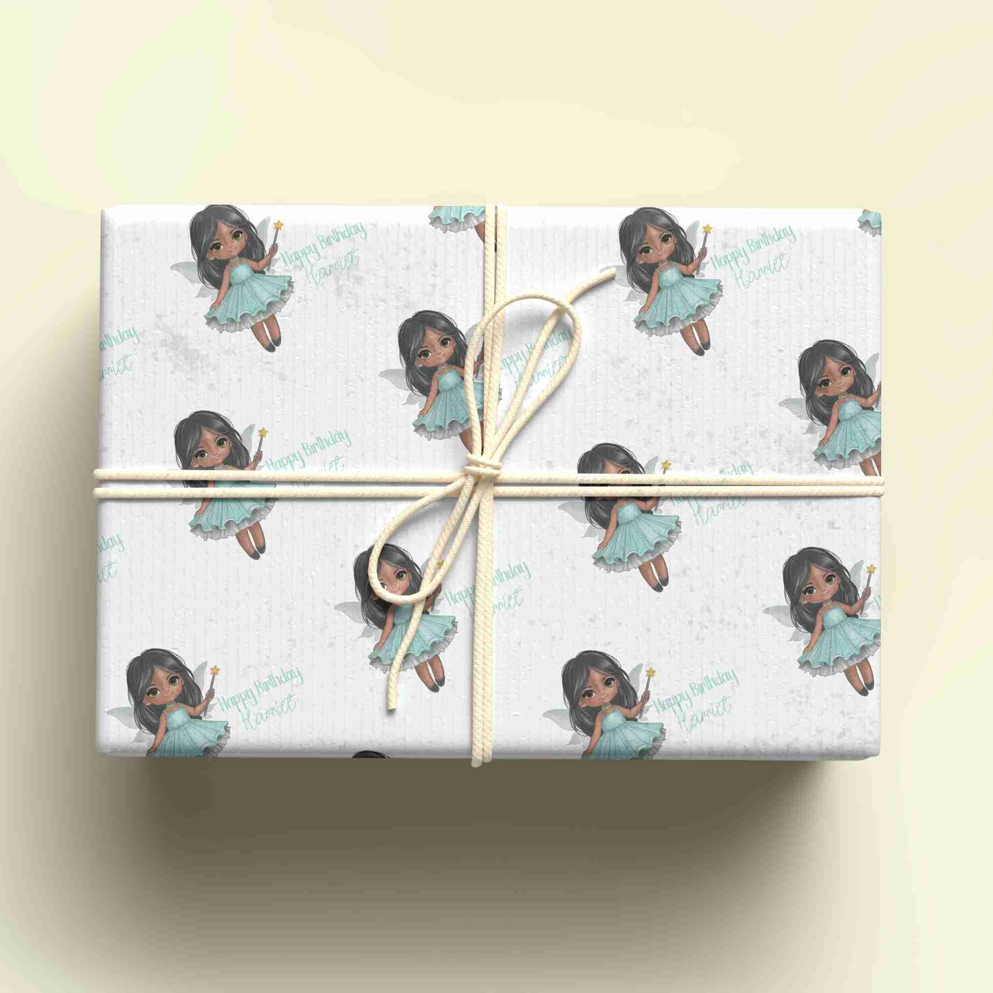 a wrapped gift box with a picture of a girl on it