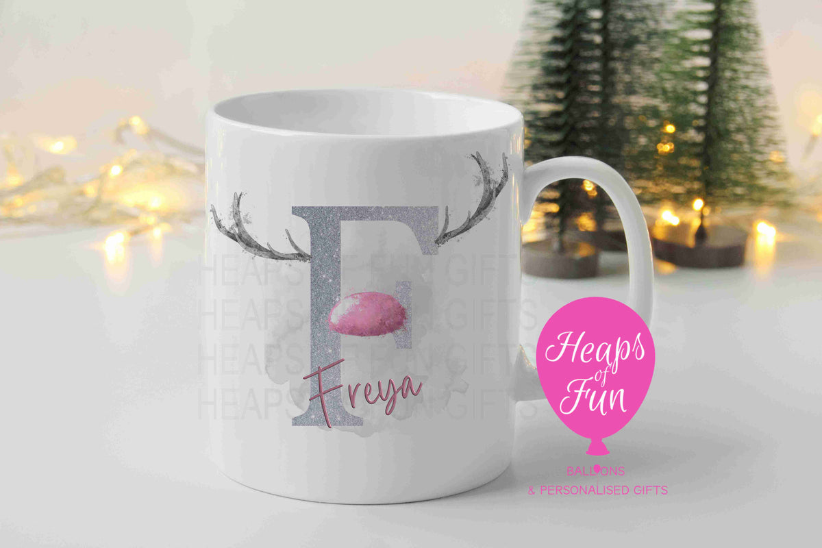 Personalised Christmas mug with silver reindeer initial, antlers, pink nose and name