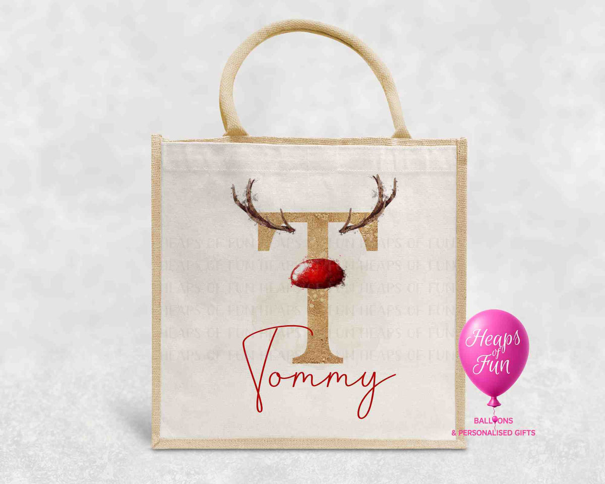 Personalised Christmas jute bag with gold reindeer initial, red nose and name