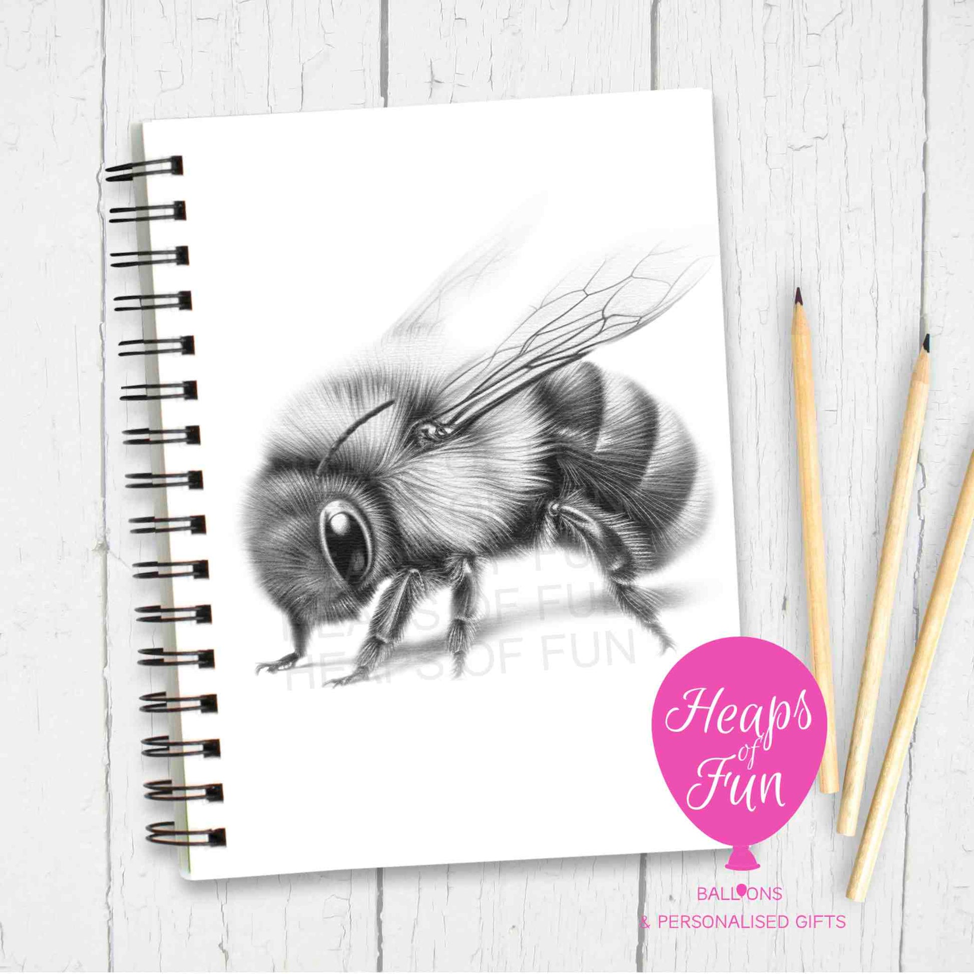 Customisable notebook with bee illustration on cover