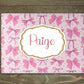 Personalised glass makeup board with pink and gold bows and custom name