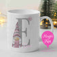 Personalised Christmas mug with pink gnome, silver glitter initial, pink snowflake and name