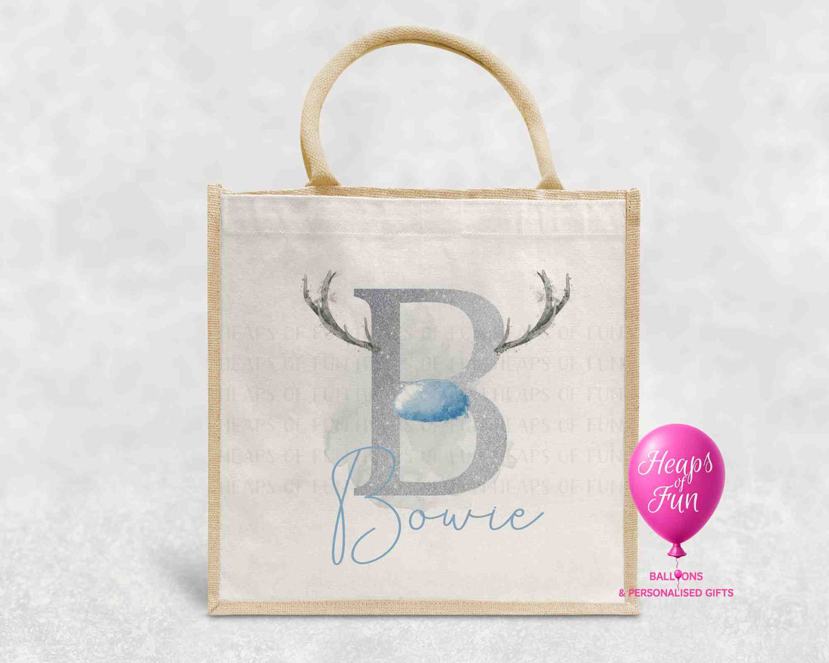Personalised Christmas jute bag with silver reindeer initial, blue nose and name
