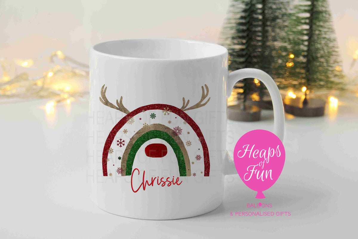 Personalised Christmas mug with red, gold and green glitter reindeer rainbow and name