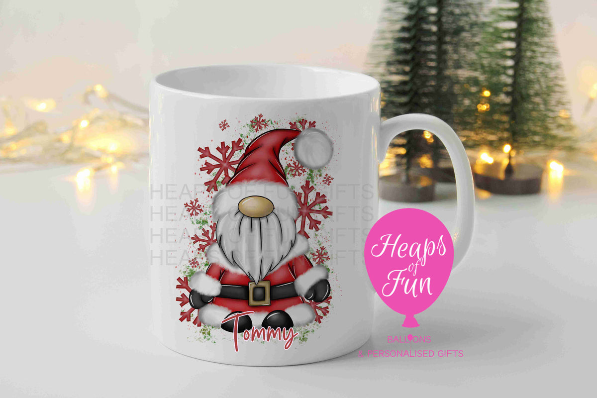 Personalised Christmas mug with red Santa gnome, snowflakes and name