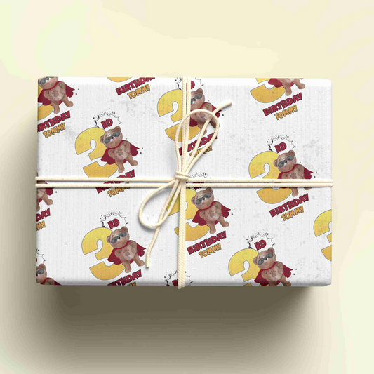 a gift wrapped in a wrapping paper with a monkey on it