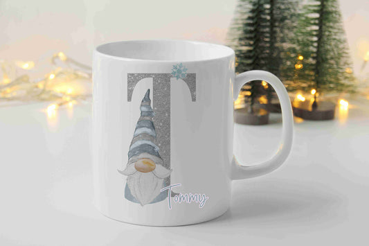Personalised Christmas mug with grey gnome, silver glitter initial, teal snowflake and name