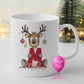 Personalised reindeer Christmas mug holding red glitter initial with baubles and name