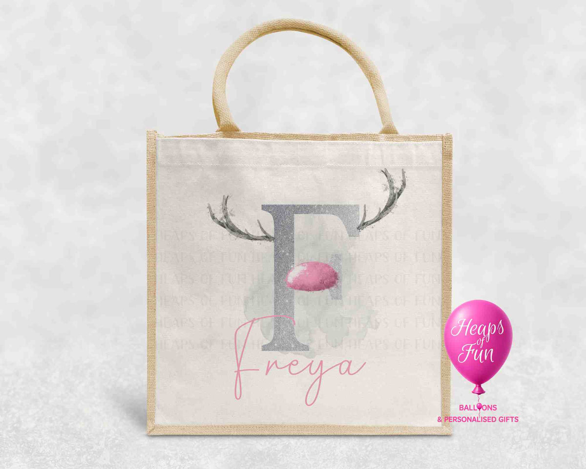 Personalised Christmas jute bag with silver reindeer initial, pink nose and name