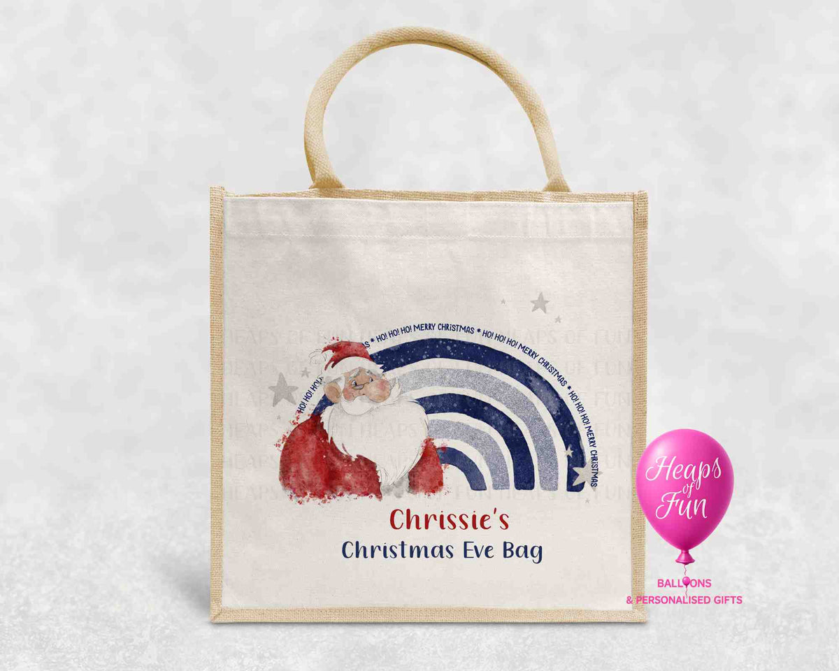 Personalised Christmas Eve bag with Santa and navy Ho Ho Ho Merry Christmas rainbow